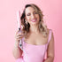 Pink revolving curling iron 